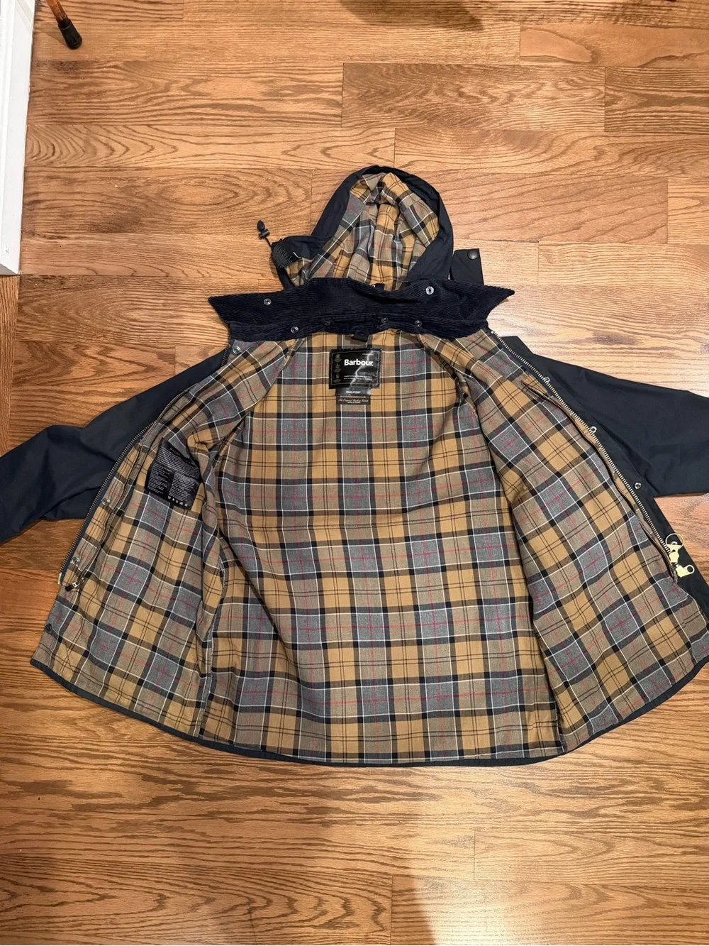 Barbour Navy Beaufort Wax Cotton Jacket with Tan Tartan Lining